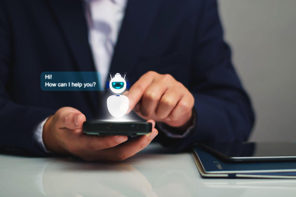 AI chatbot assistant replying to customer messages on a phone