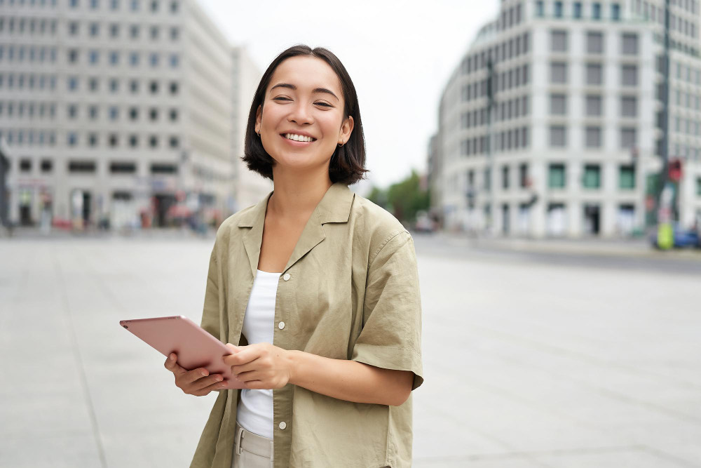 Business owner checking customer messages on a tablet